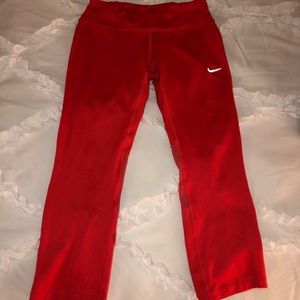 Reddish/coral Nike crop workout leggings